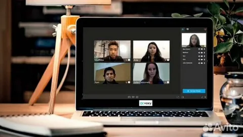 Pakistani teacher transitioning from traditional to online teaching using digital tools.