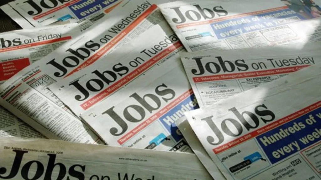 Teacher in a classroom with students, symbolizing teaching jobs in the USA